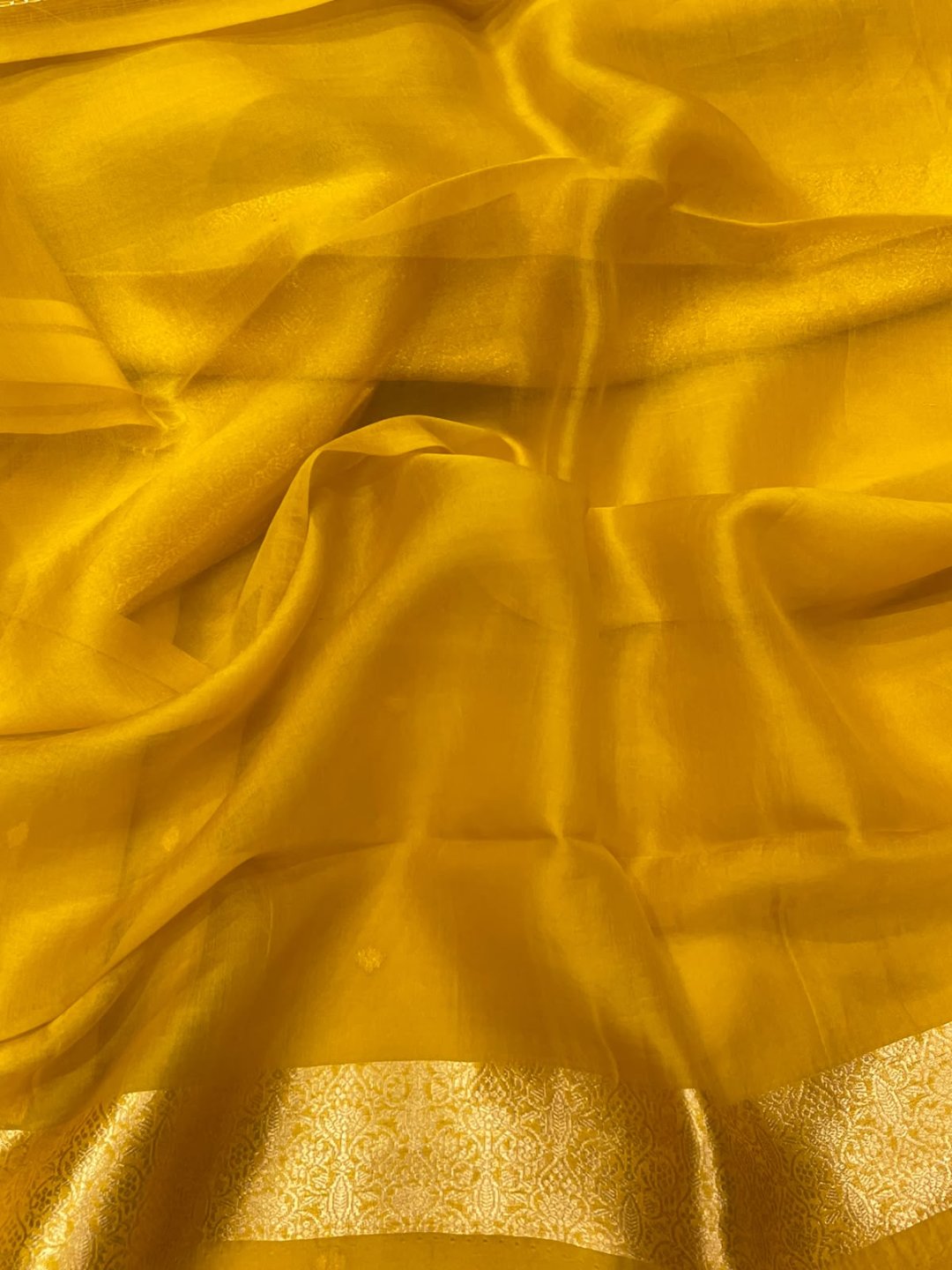 Dark yellow Kora Silk Banarasi saree full spread
