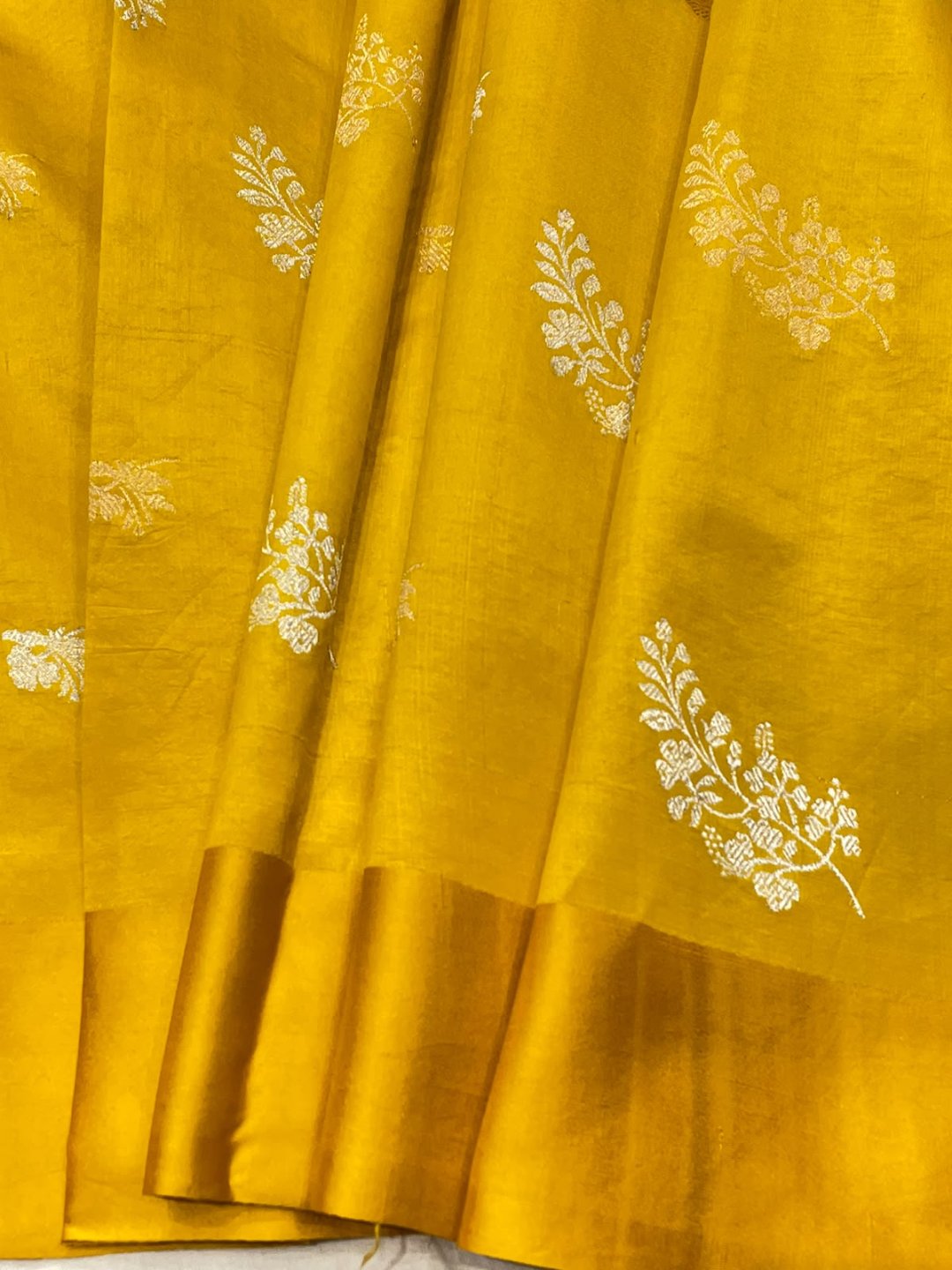 Lemon Yellow Katan Silk Banarasi saree border closeup