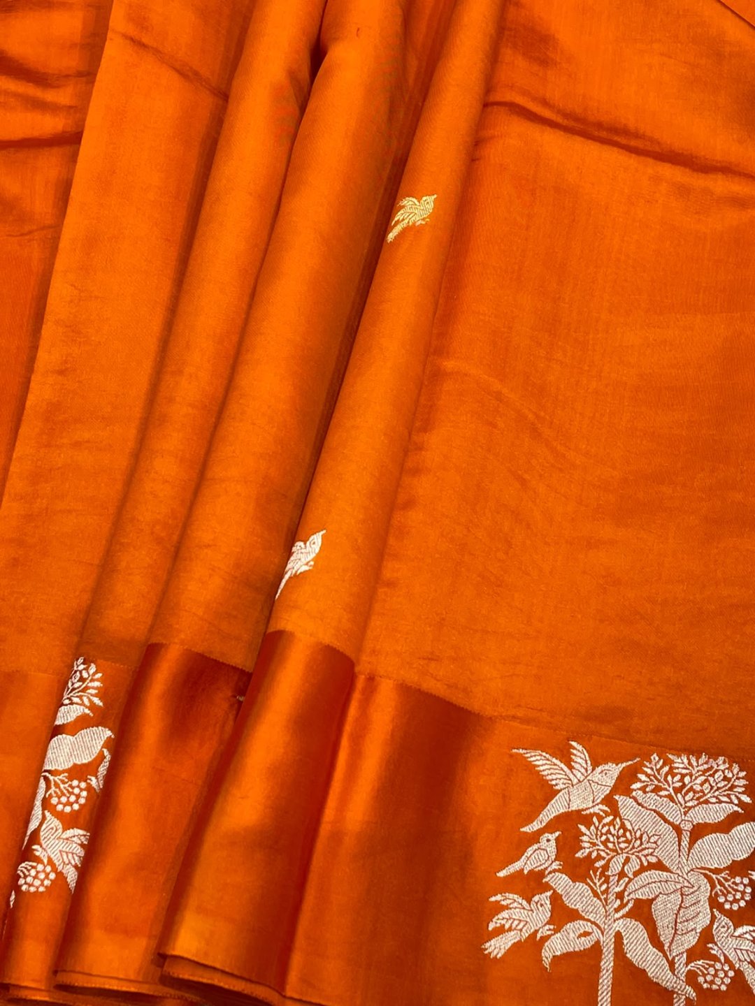 Burnt Orange Katan Silk Banarasi saree border closeup
