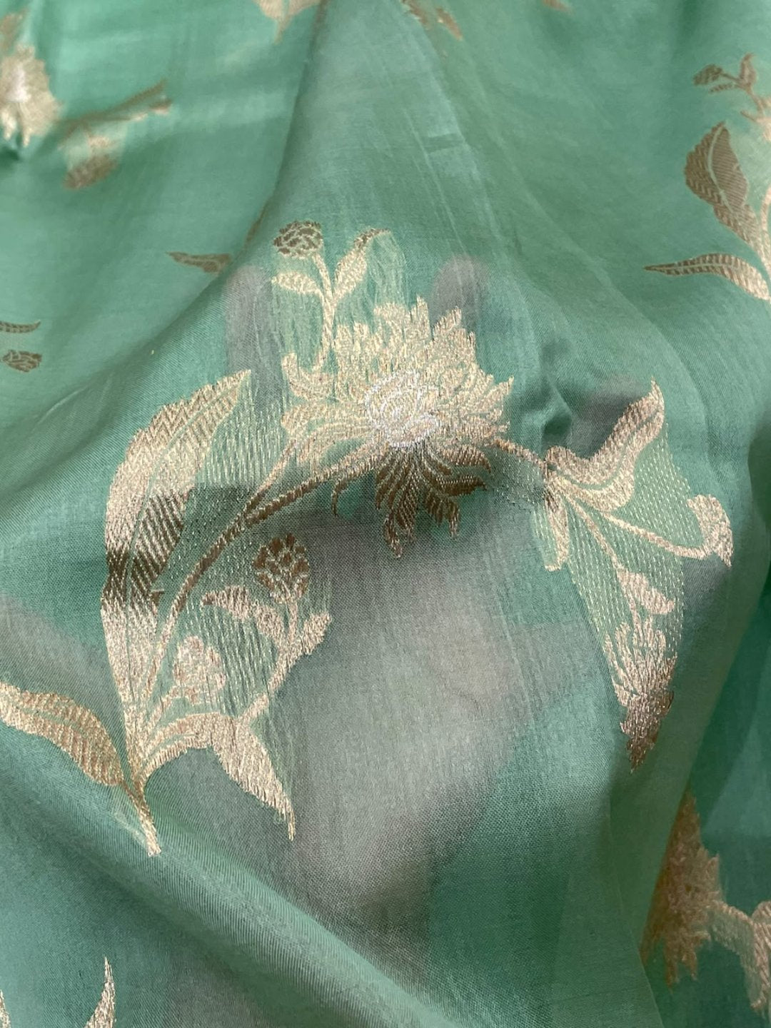 light green Kora Silk Banarasi saree border closeup