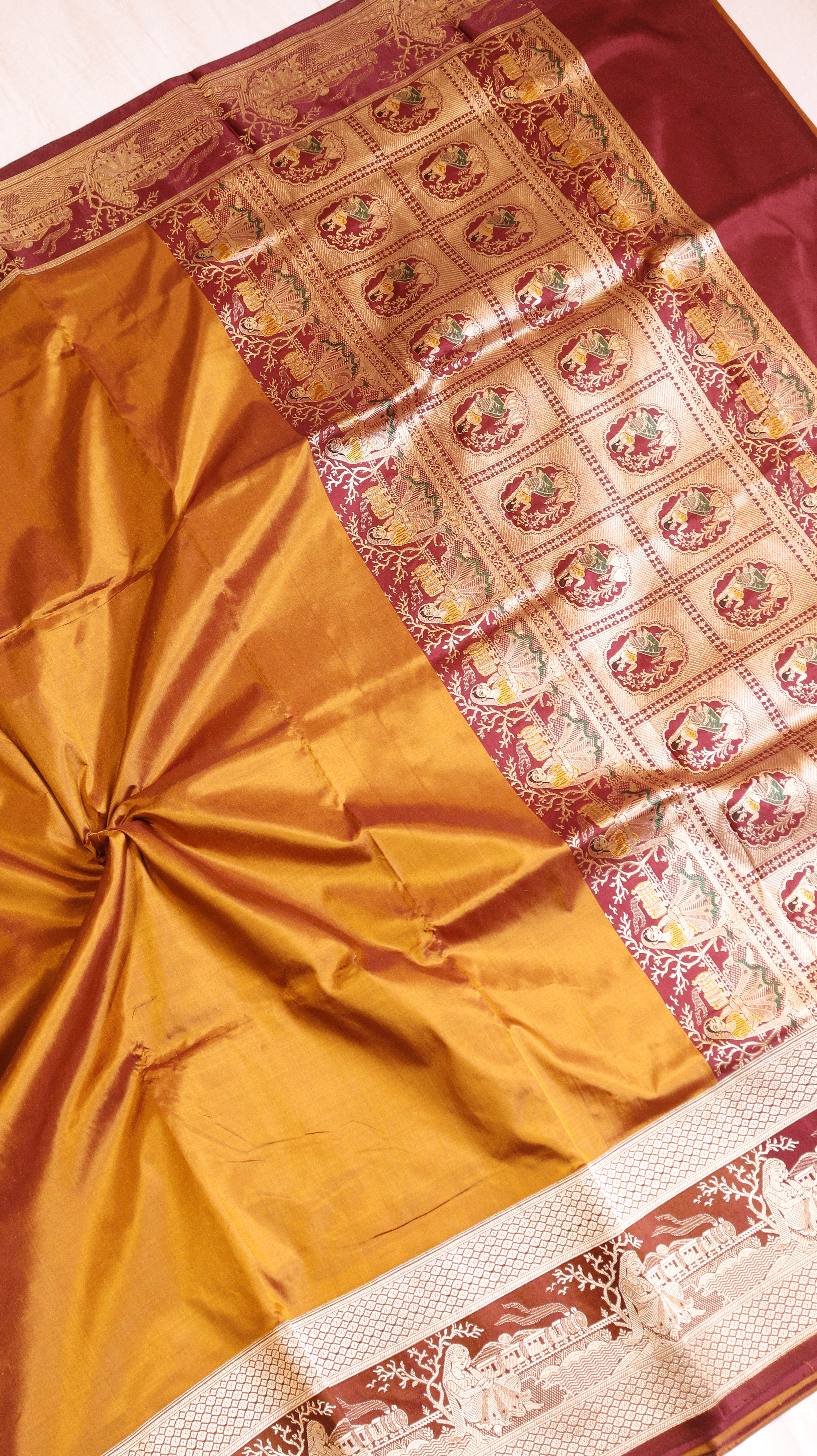 Gold Mustard Pure Katan Silk Handloom Saree with Graceful Sitting Women showing Calm in Border