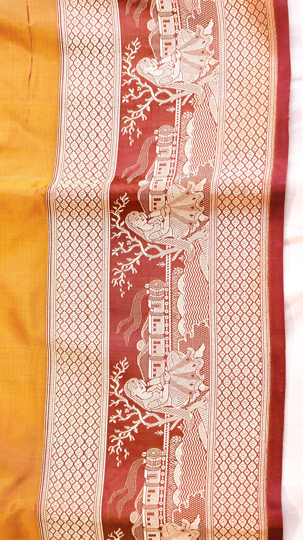 Gold Mustard Pure Katan Silk Handloom Saree with Graceful Sitting Women showing Calm in Border