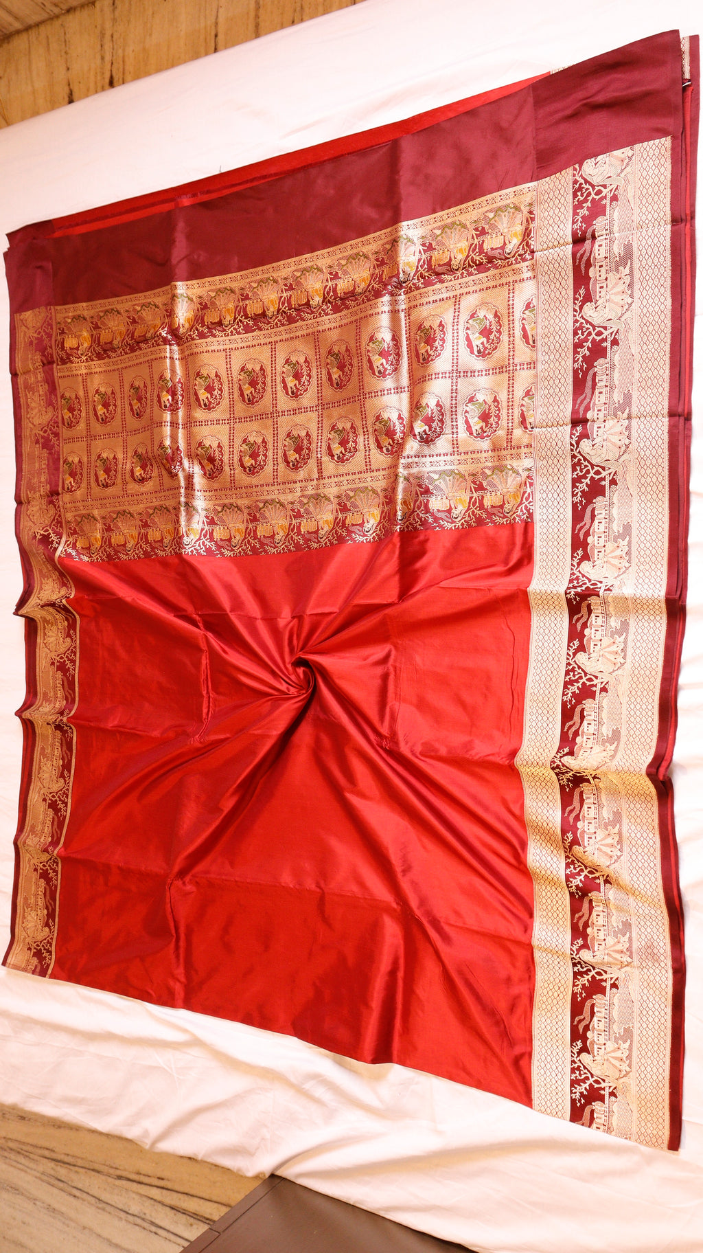 Red Pure Katan Silk Handloom Saree with Graceful Sitting Women showing Calm in Border
