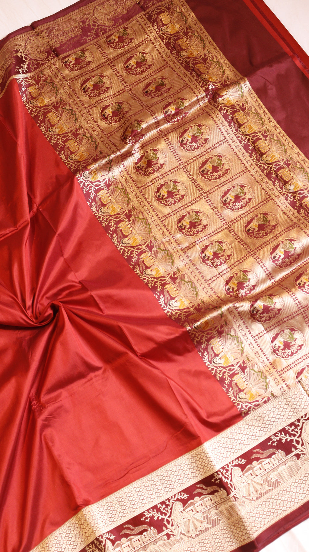 Red Pure Katan Silk Handloom Saree with Graceful Sitting Women showing Calm in Border
