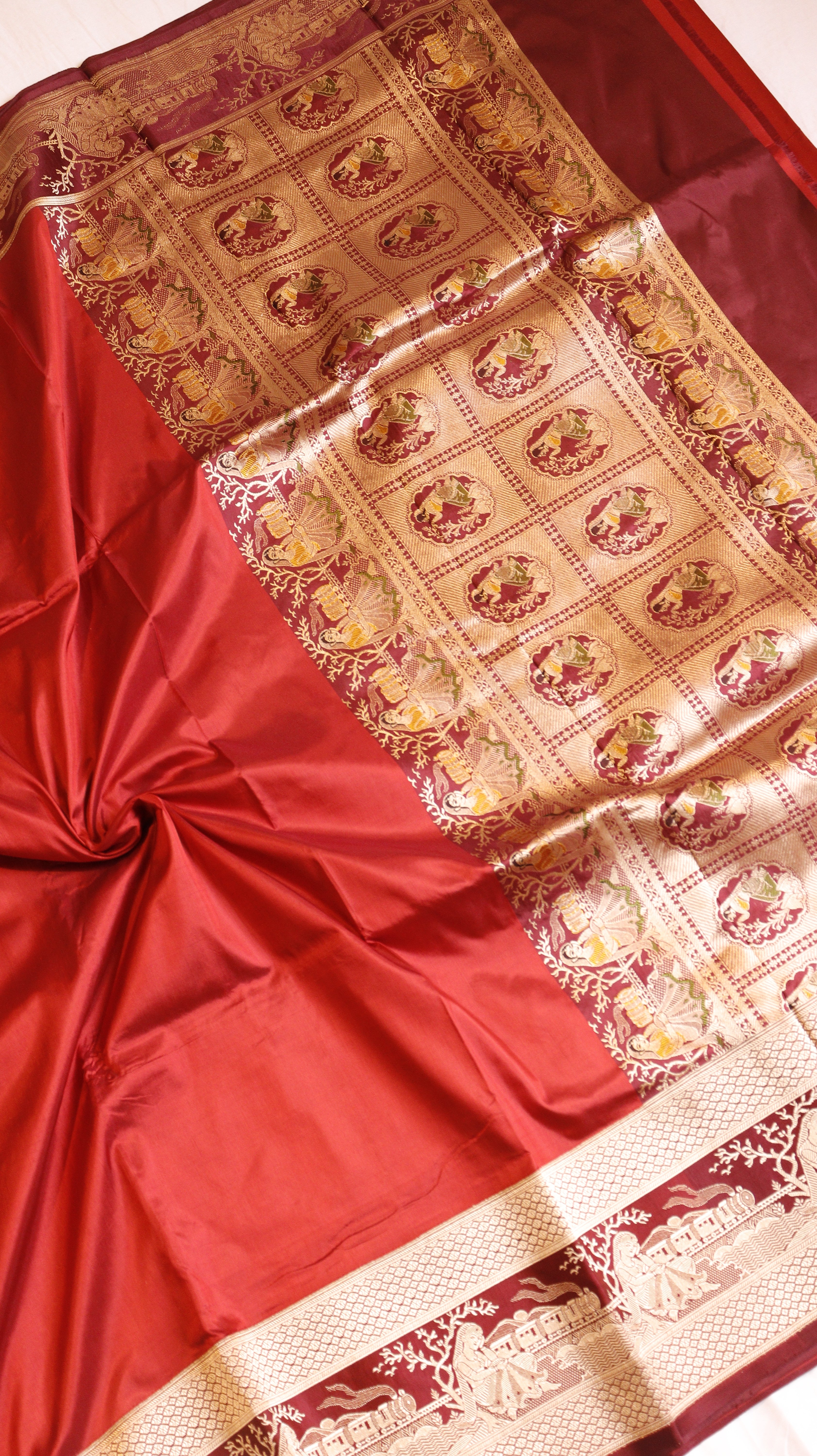 Red Pure Katan Silk Handloom Saree with Graceful Sitting Women showing Calm in Border