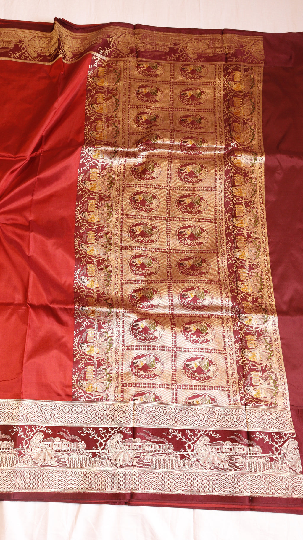 Red Pure Katan Silk Handloom Saree with Graceful Sitting Women showing Calm in Border