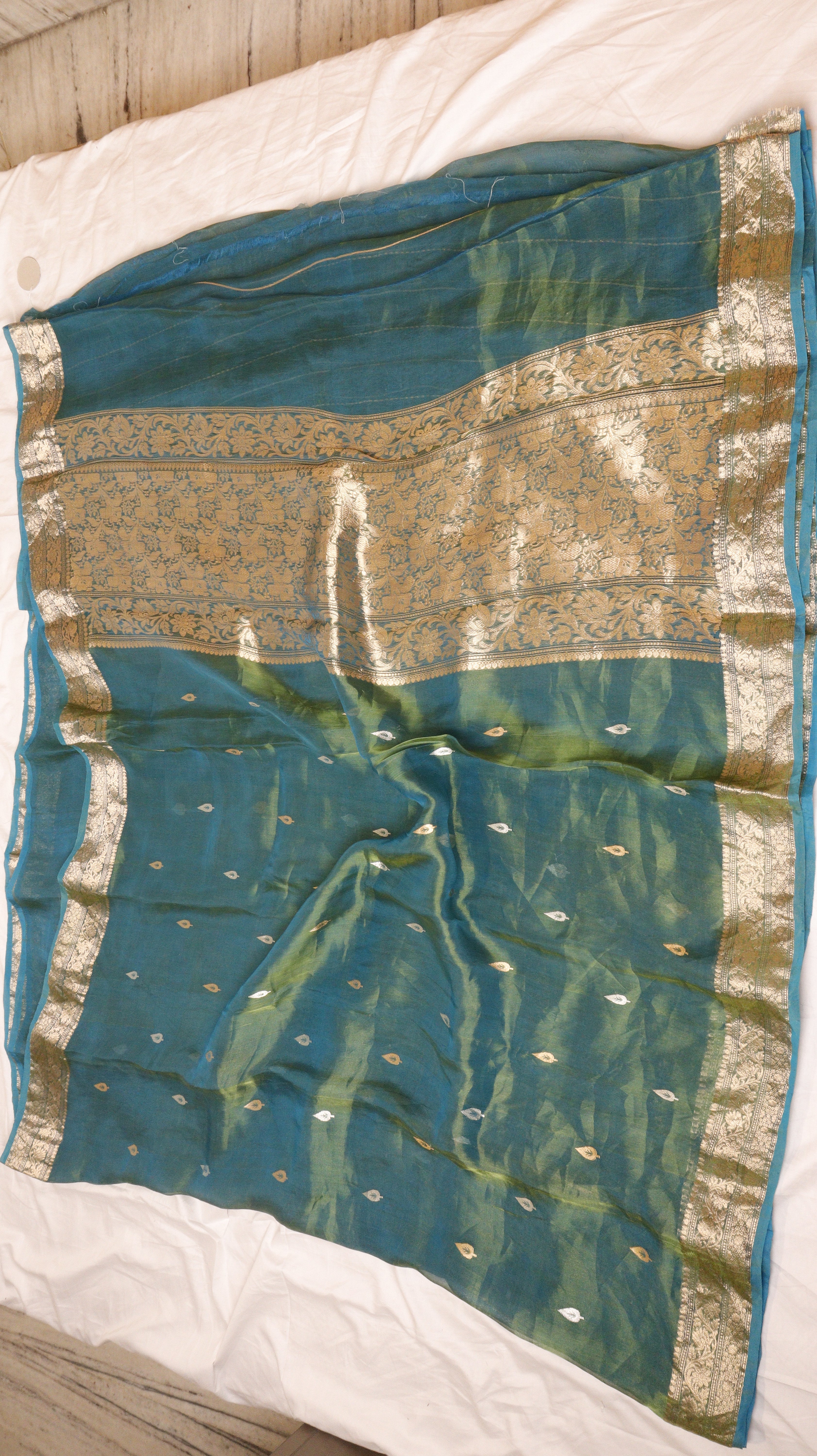 Pre-Order : Teal Blue Pure Tissue Silk Handloom Saree with Floral Border