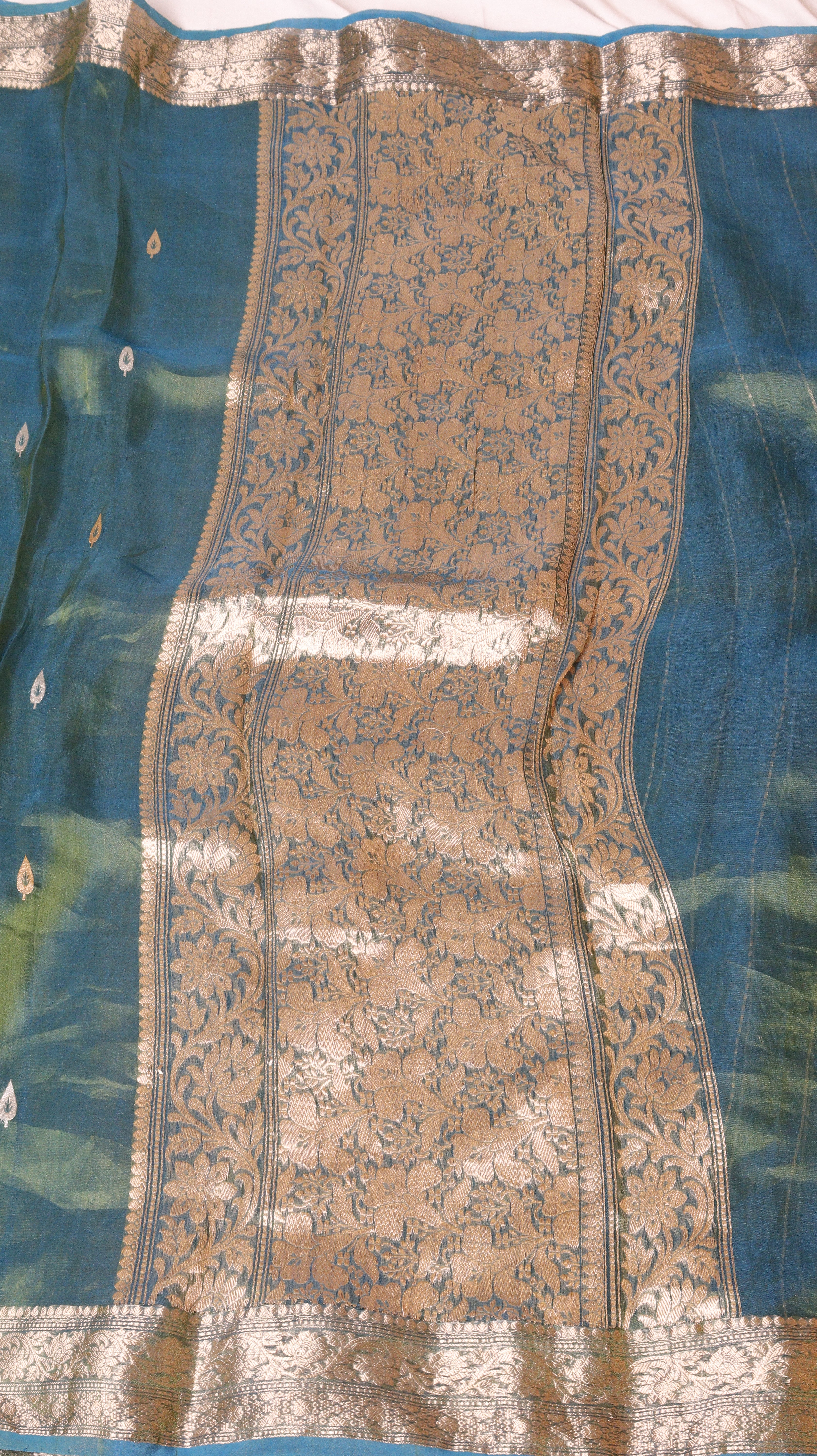 Pre-Order : Teal Blue Pure Tissue Silk Handloom Saree with Floral Border