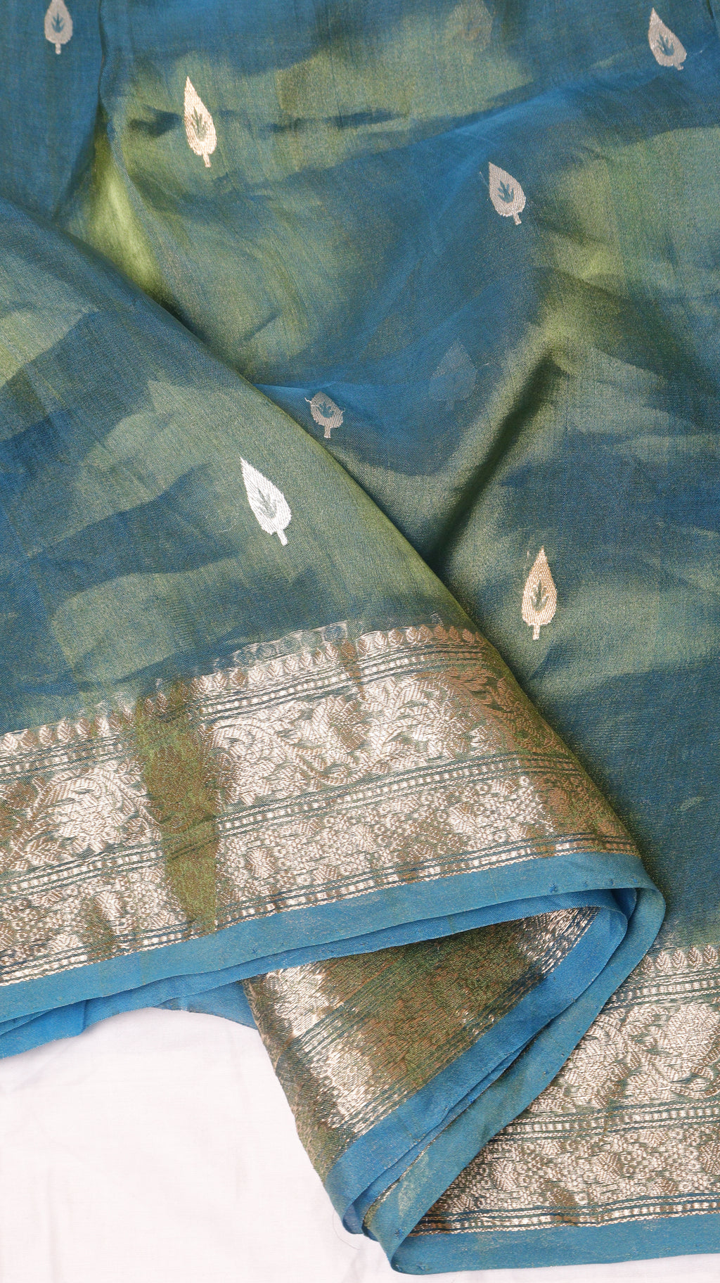 Pre-Order : Teal Blue Pure Tissue Silk Handloom Saree with Floral Border