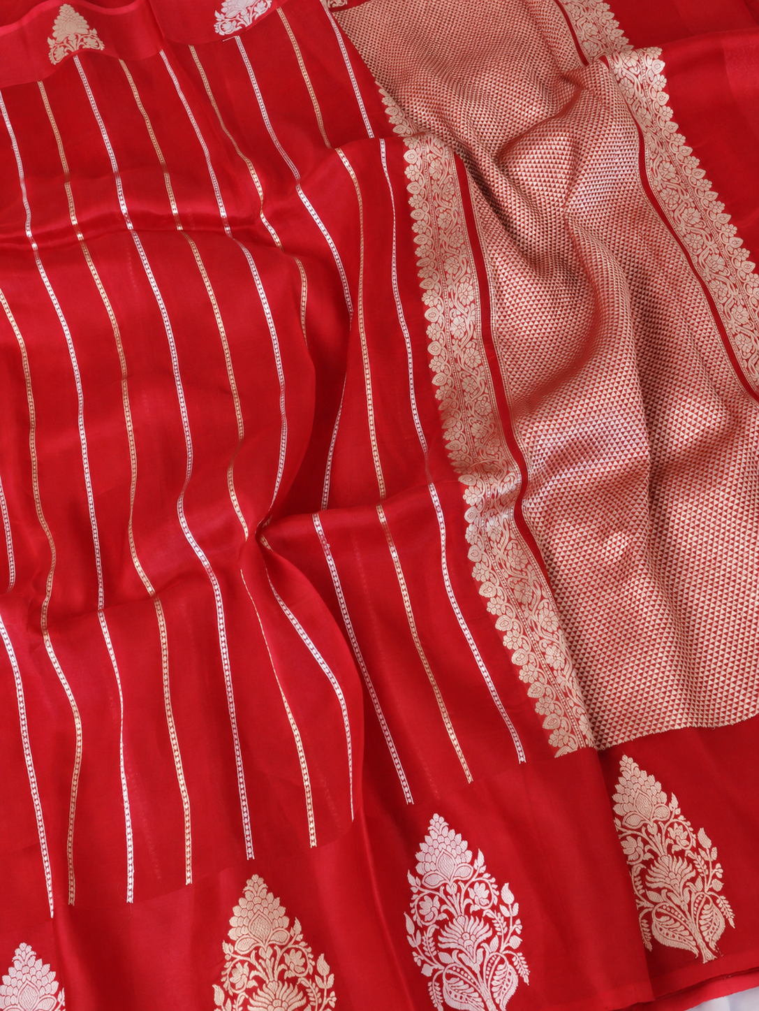Vermilion Red Banarasi Saree with Silver-Toned Zari Stripes & Floral Pallu